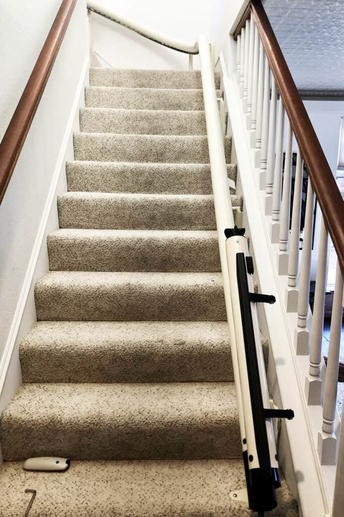 Automatic Powered Hinge in Up Position on Curved Stair Lift